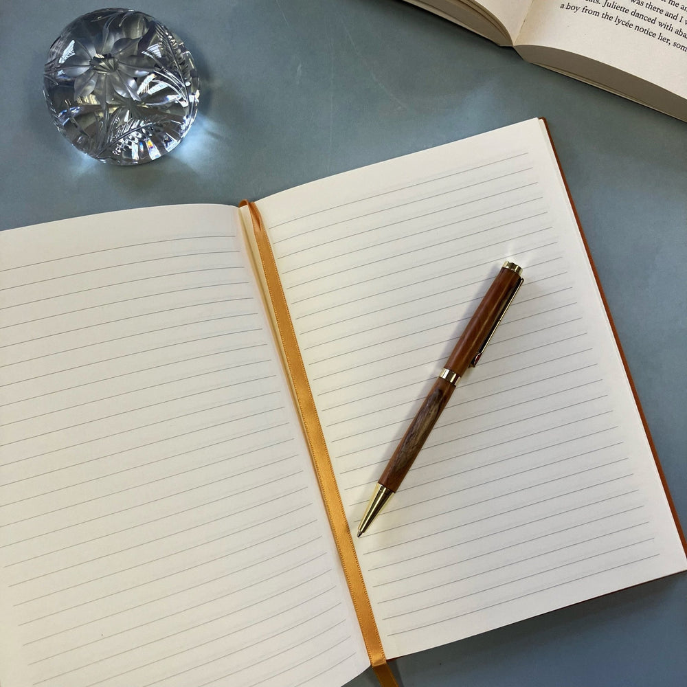 
                  
                    Orange Bee Notebook - The Willoughby Book Clubnotebook
                  
                
