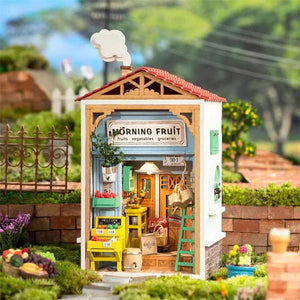 
                  
                    Morning Fruit Store Miniature House - The Willoughby Book Club
                  
                